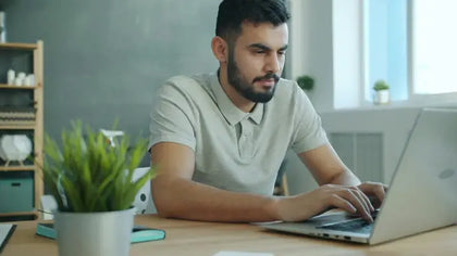 Learner studying online with a laptop